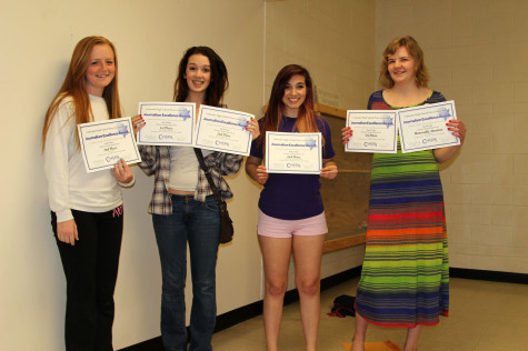 The winners of the Media Awards holding their certificates. Katelinn Root (11), Daisy Erickson (11), Justina Nanfito (12), Hannah Tooley (12) 